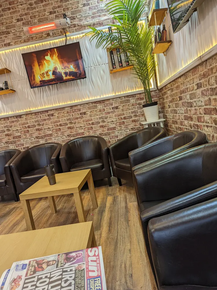 Leather lounge seating at Turkish Barber Club